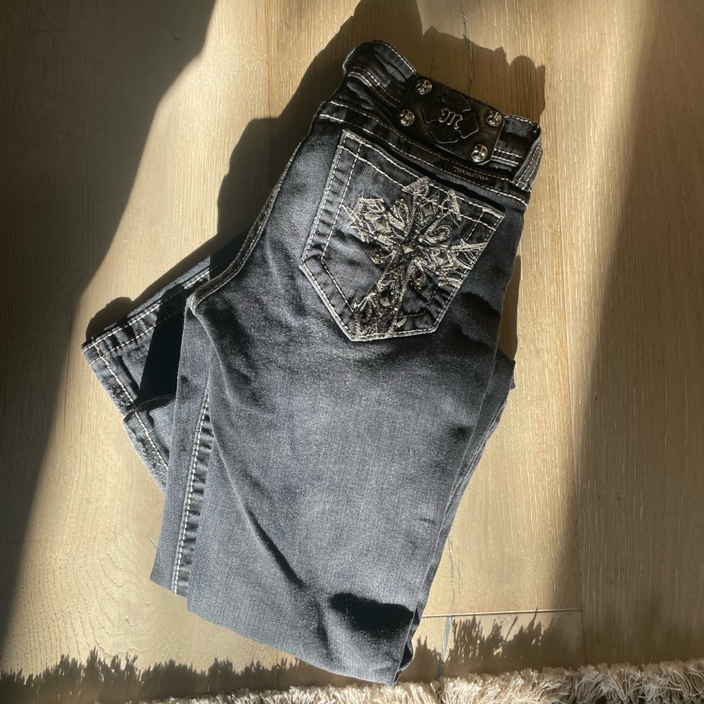 Bootcut blue Miss Me jeans with rinestone cross pockets!